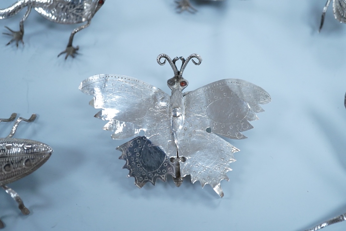 Six Thai or Malaysian white metal models of creatures, to include a Praying Mantis, height 45mm, a tortoise, a dragonfly, a butterfly, a lizard and a beetle.